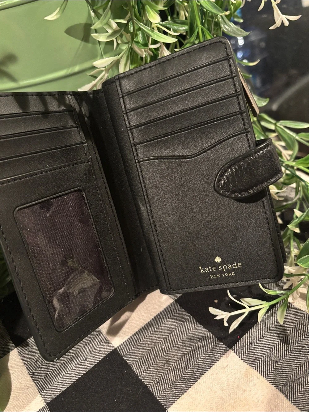 kate spade black pebbled leather compact wallet with gold logo